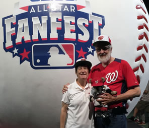 Photo of Sarah, Eric and teddy bear at Fan Fest