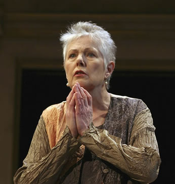 Redgrave with palms together in production pic